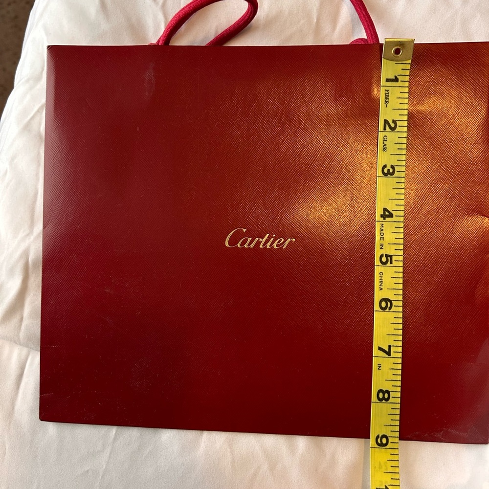 Red authentic Cartier shopping bag